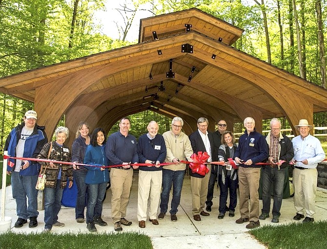 Supervisor Foust, Fairfax County Park Authority representatives, and community members celebrated the opening of the Outdoor Education Classroom/Picnic Shelter at Riverbend Park.