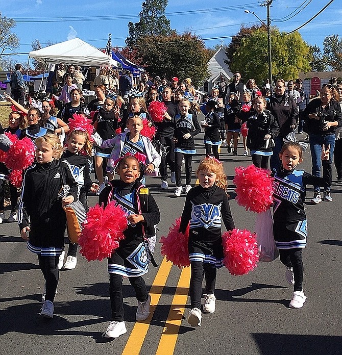 Southwestern Youth Association cheerleaders marching during last year’s Centreville Day parade. This year’s celebration is Oct. 17, but due to the pandemic, will be held online.