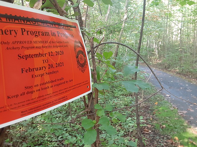 These orange signs are posted at the trailhead in places where the archery program is conducted.