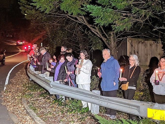 More than one hundred Mount Vernon residents joined Bijan Ghaisar’s family in a candlelight vigil at the shooting site in November, 2018.