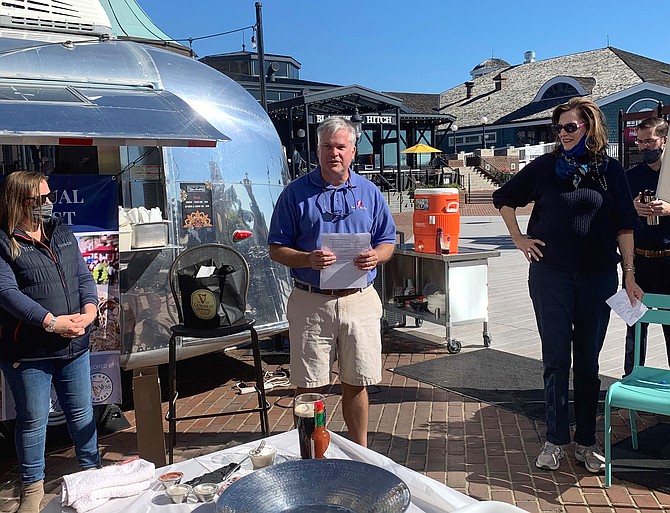 Page Moon gives instructions to the competitors at the start of the first annual Oyster shucking Contest Oct. 17 at the City Marina. The contest was the culmination of Oyster Week and sponsored by the Old Town Business Association.