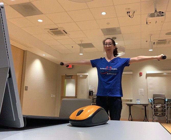 Rose Robinson, instructor and  Senior Services Recreation Therapist at ServiceSource, Inc., leads a virtual SAIL (Stay Active and Independent for Life) class for strength and balance.