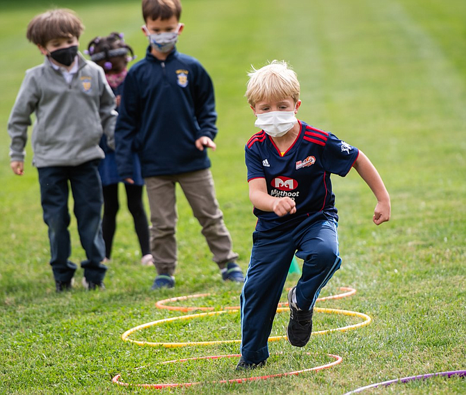 It's a race through the hoops for Bullis School Lower School students during Founders Festival Week.