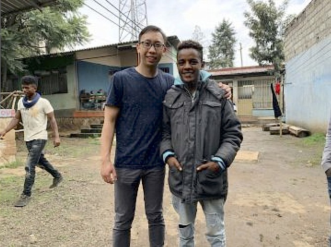 McLean filmmaker Josh Leong with a 17-year old orphan boy, Abel, whose life story inspired a short film on the Ethiopian orphan crisis, premiering online on Nov. 20.