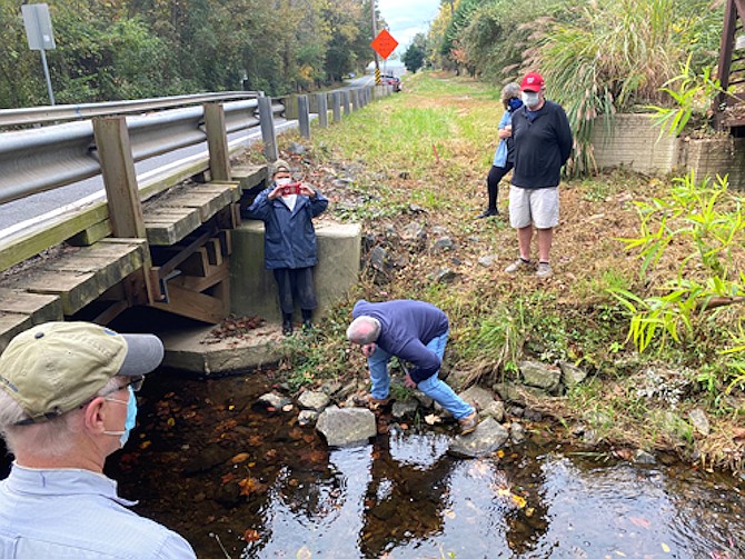 Members of the GFCA Bridge Working Group inspect the Springvale Road Bridge recently, as GFCA President Bill Canis (foreground) looks on.