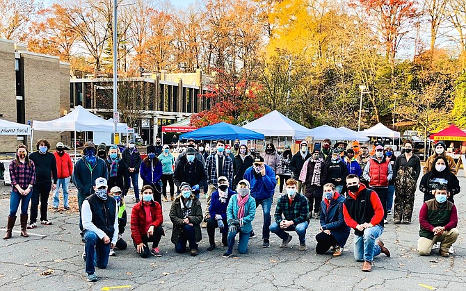 The farmers/vendors and volunteer managers of the Reston Farmers Market.