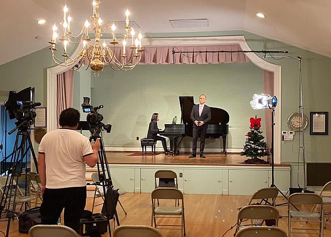 Carlos Macher directs rehearsal of Opera NOVA’s Virtual Christmas program on Saturday, December 4. Baritone Jose Sacin rehearses with Titiana Loisha on piano.