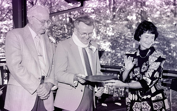Richard Sargent (center), and Chet McLaren honored for park volunteerism with named pavilion and certificate bestowed by then Braddock District Supervisor, Sharon Bulova –  September 1999.