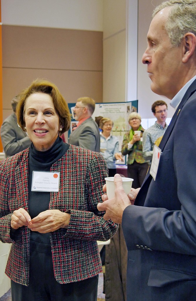 Mark Jinks, Alexandria City Manager, chats with Arlington County Board Chair, Libby Garvey, before the 2019 Virginia Cooperative Extension breakfast where Jinks showed off his 4-H T-shirt. Kids in his family started 4-H at seven years old, where he and his brother got cows, ponies and had a Christmas tree farm. Jinks’ father went on to become 4-H Director of the State of Pennsylvania.