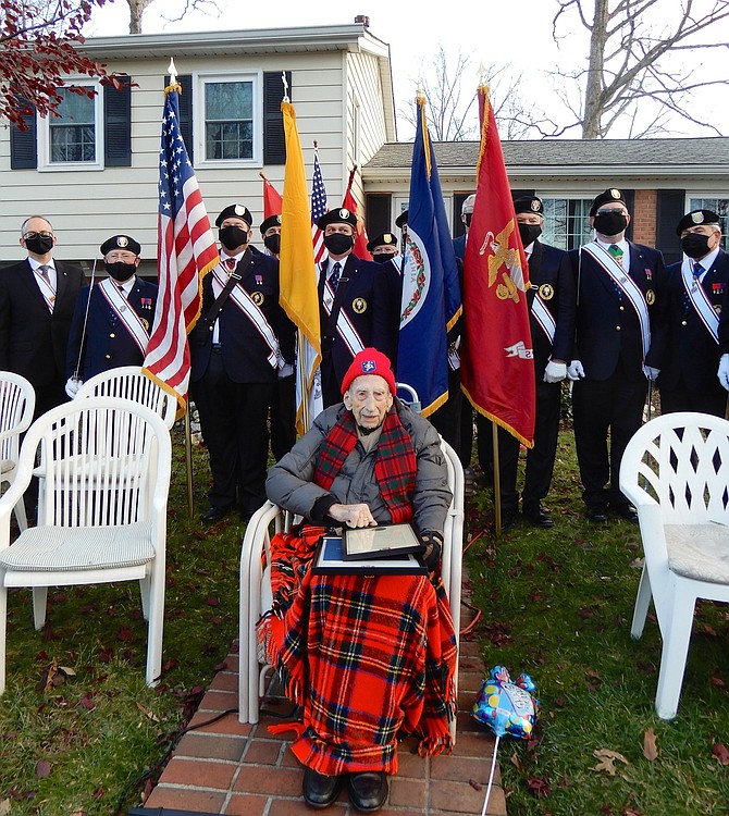 The Knights of Columbus help Fairfax’s Jim Smith celebrate his 100th birthday.