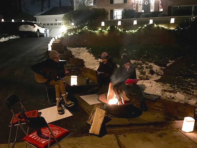 The musical Juneau family played Carols by their bonfire.