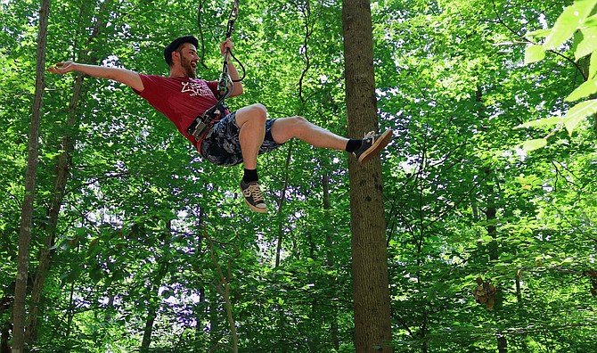 Flying through the Go Ape course in Fairfax County.