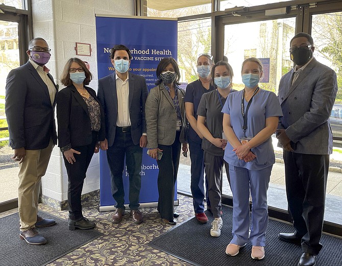 COVID-19 Vaccine partnership leaders pose at Macedonia Baptist Church in Arlington. Left to Right: Rev. Craig Harcum from the church; Neighborhood Health staff Martha Welman, M.D., Basim Khan, M.D., Cynthia Sturdevant, Mary Hill, Amanda Hirsch, and Jessica McKee; and Lamont West, Trustee of the Macedonia Baptist Church.