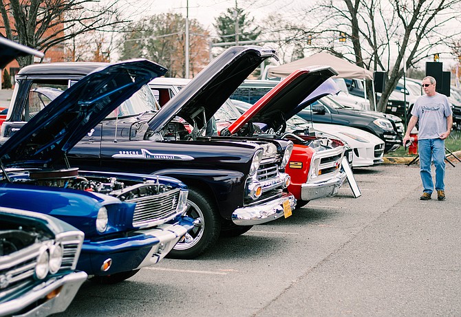 Shiny cars showing off their engines during 2019’s Casey’s Automotive car show.