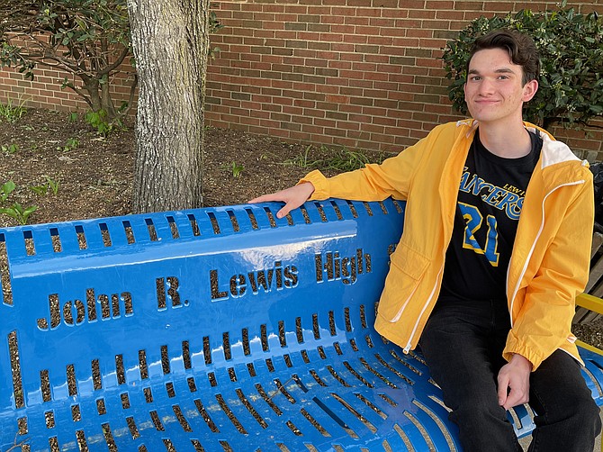 Charles Childers, new poet and graduating senior, delivered his tribute to civil rights leader John R. Lewis, leading off special tributes to Lewis at the high school’s rededication ceremony.