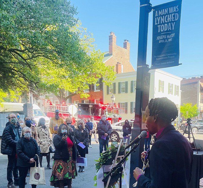 Rev. Professor Quandricos B. Driskell of Beulah Baptist Church, right, opens the April 23 ceremony remembering the 1897 lynching of Joseph McCoy at the corner of Cameron and Lee streets.