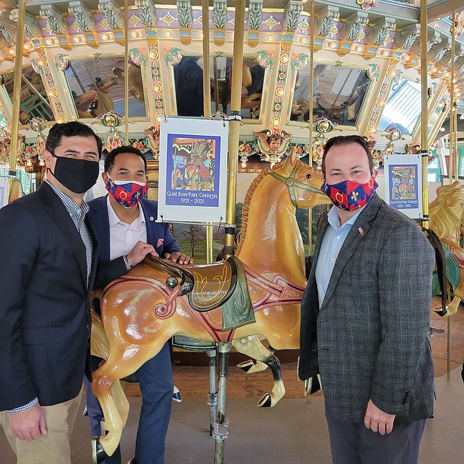 At-large councilmembers Gabe Albornoz and Will Jawando, with Potomac’s councilmember Andrew Friedson, at the 100th anniversary of Glen Echo’s carousel on Saturday, May 1, 2021.