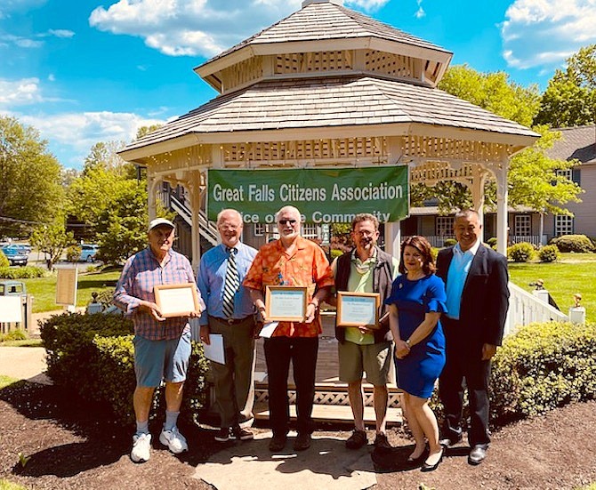 (From left) GFCA Past President Glen Sjoblom; GFCA President Bill Canis; Eric Knudsen, the 2021 recipient of the Great Falls Citizens Association Glen Sjoblom Award and former GFCA president; former GFCA vice-president Phil Pifer; Virginia State Senator Barbara Favola (D-31); and former GFCA Board Member, Gary Pan, on the Village Green following the May 15 Awards Ceremony honoring Knudsen.