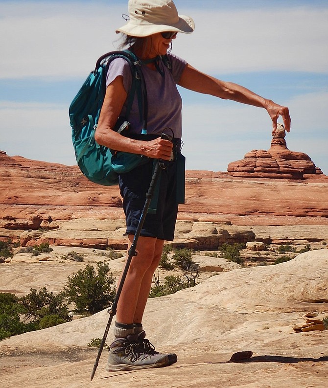 Travel enthusiast Arlene Richter, pictured here in the Needles district of Utah’s Canyonlands National Park, is fully vaccinated and ready to resume her travels.
