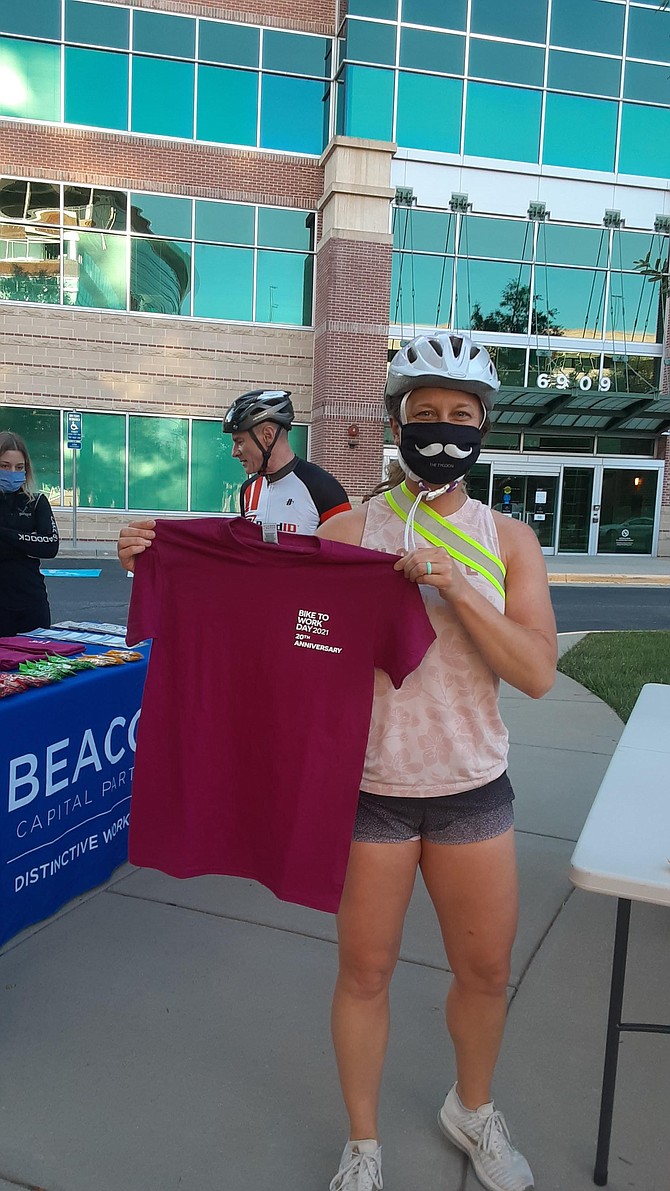 Kingstowne resident Aspen Guthrie and her Bike to Work Day tee shirt.