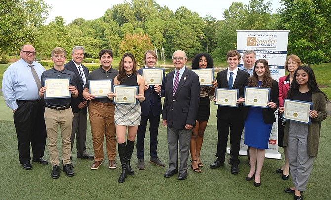 (Left to right) Mark Murray, Chamber Chairman, Fort Belvoir Swim Team; Gershon Price, Lewis High School; George Ksenics, Mount Vernon Lee Education Partnership; Marcos Montoya, Mount Vernon High School; Julie Wu, West Potomac High School; Jayden Brown, Edison High School; General Robert Jorgensen, Army Retirement Residence Foundation – Potomac; Bemente Abegaz, Lewis High School; Craig Kalkwarf, South County High School; Tim Mayo, Covanta Fairfax; Sara West, South County High School; Alison Ross Tompkins, Chamber Vice Chair, The Fairfax; Dina Cazun-Moreno, Hayfield Secondary School.