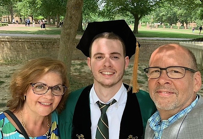 Nick Balenger with his mother, Sylvie Balenger, and father, Steve Balenger, at his graduation from William and Mary Law School on May 22.
