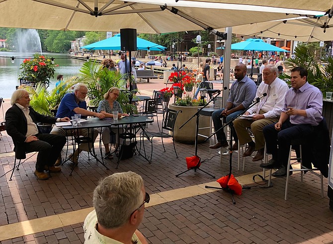 With Lake Anne and its sparkling fountain as a backdrop, candidates for Va. Lt. Governor took questions from a panel of Reston civic leaders and residents on the patio of Kalypso’s Sports Tavern.  The forum was sponsored by Reston Strong, hosted by Kalypso’s and Cafe Montmartre.