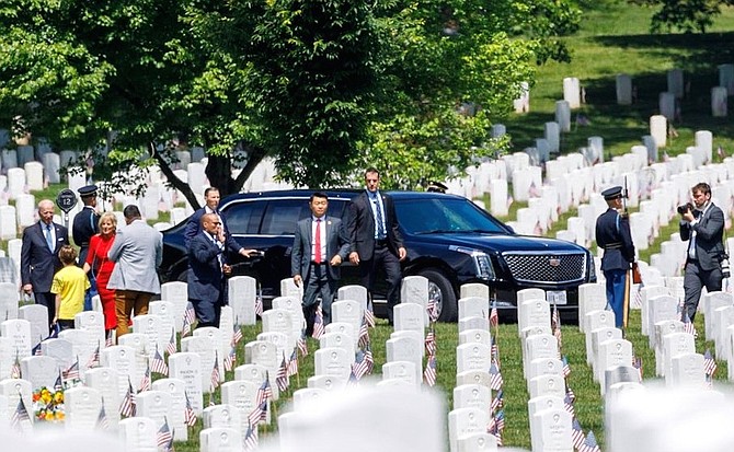 President Joe Biden and First Lady Jill Biden visit Section 12 of Arlington National Cemetery following Biden’s Memorial Day remarks and wreath laying at the Tomb of the Unknown Soldier May 31. Section 12 is one of the primary burial locations of service members killed overseas and repatriated to the United States after World War II and the Korean War.