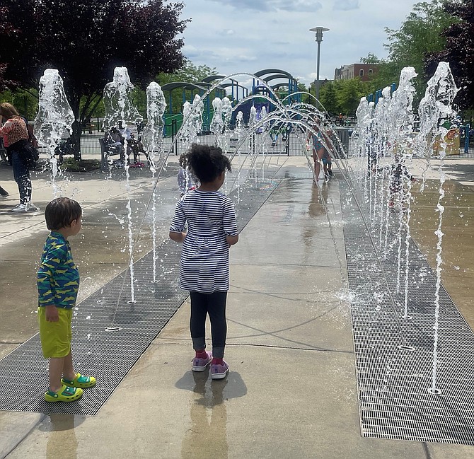 The interactive water fountain at Potomac Yard Park features 36 jets with programmed lighting sequences.