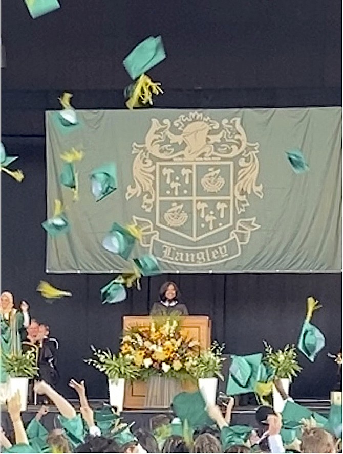 Officially announced graduates, the Langley High School Class of 2021 throws their caps in the air, symbolically ending a chapter in the graduates' lives.