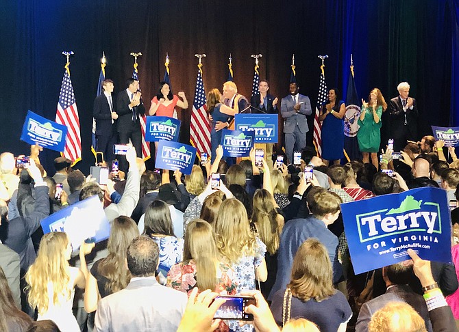 Democrats celebrate former Gov. Terry McAuliffe's victory Tuesday night in McLean.