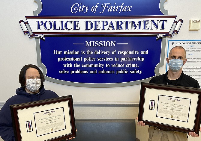 (From left) Fairfax City Police Dispatcher Cynthia Tetterton and Lt. Michael Bartholme display their awards.