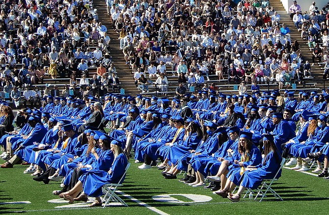 Smiling students looking forward to graduating from Fairfax High.