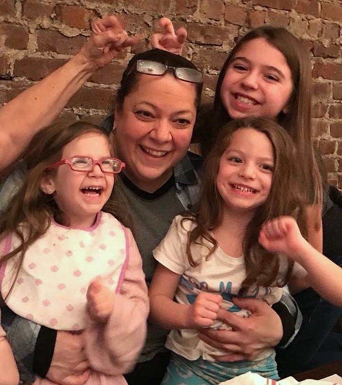 Therapist Dianne Galasso, pictured here with her grandchildren, says that many children are burnt out after the pandemic school year and supporting their emotional and mental wellbeing should be the priority this summer.