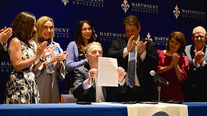 Sen. Jennifer Boysko; President Irma Becerra; Karla Mercado Dorado, sophomore at Marymount University; Gov. Ralph Northam; Del. Alfonso Lopez; Sen. Barbara Favola.