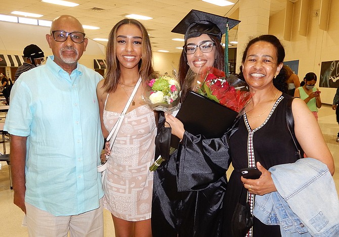 (From left) dad Solomon Tekola, sister Eden Solomon, grad Eve Solomon and mom Menbere Wija.