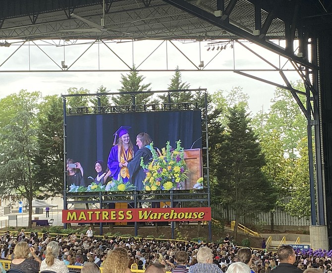 Associate Principal Lindsey Kearns presented the faculty award to graduate Taylor Brooke.