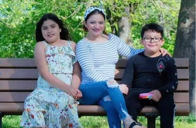 Claudia Menjivar, 34, of Herndon with her children, Dayana Gutierrez, 12, and Carlos Josué, 9.