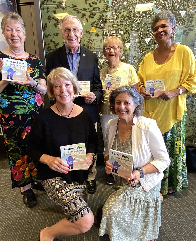 (From bottom left to top right) The Reston Reads Team: Dr. Elizabeth English, Roberta Gosling, Kathy Leatherwood, Delegate Ken Plum, Pat Fegi, and Carol Bradley.