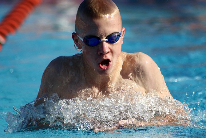 Charlie Greenwood swims the boys' 13-14 50 breaststroke, breaking a 46-year-old Donaldson Run team record.