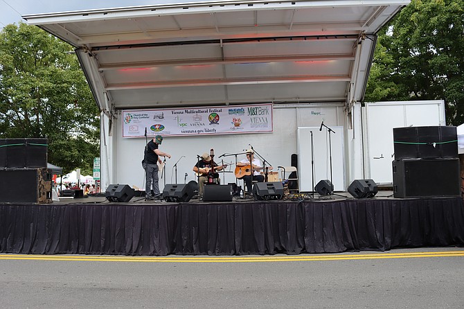 Performers of Rumisonko get ready to play Bolivian Folk Music.