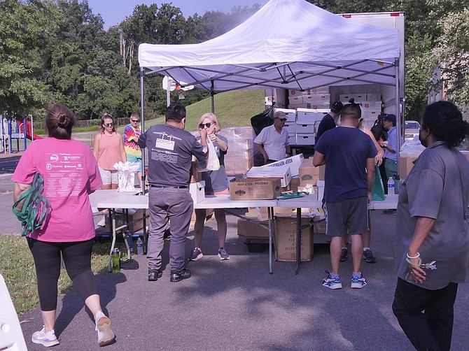 A new food distribution center opens on the basketball court at William Ramsay Recreation Center Saturday, July 17.