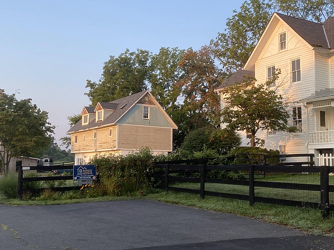 (From left) The Turner Farm garage is located behind the main farmhouse. It will be used as a public benefit association facility providing meeting space for grief and bereavement programs.