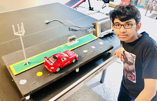 A project about sending energy through the road to electric cars led to Kriesh Tivare of McLean, seventh-grader at Cooper Middle School, becoming a State Merit Winner.