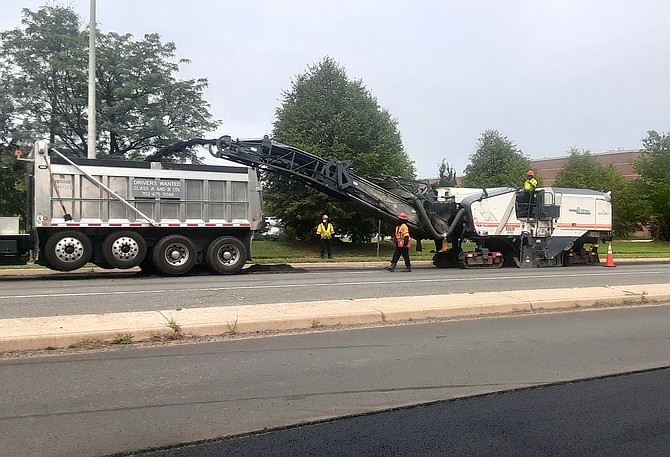 The crews here are scraping the old pavement up, and sending it back to the plant where it gets remixed as recycled asphalt.