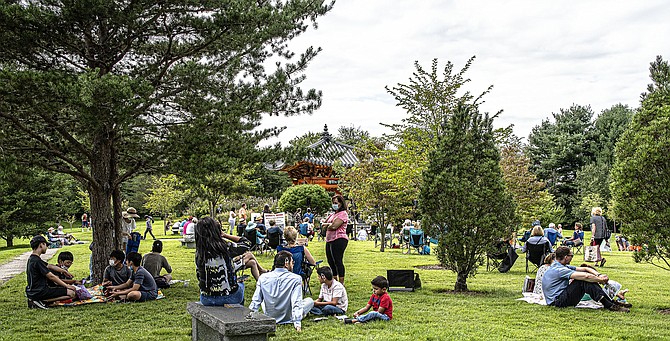 Patrons taking in a recent VCO concert at Meadowlark Botanical Garden.