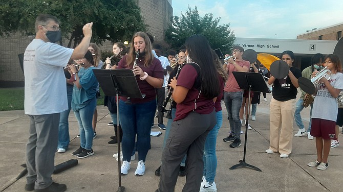 The Mount Vernon High School band provides the sounds for the first day of school in Fairfax County.