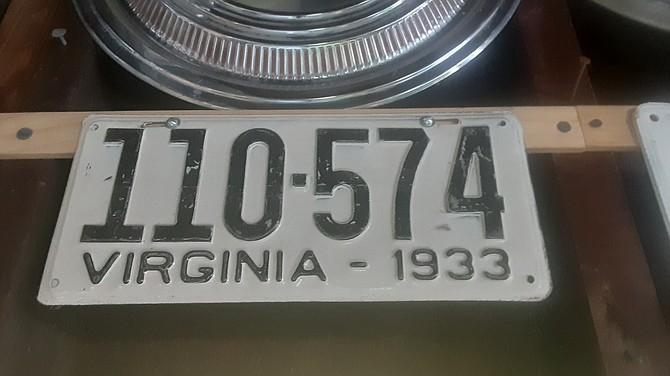 Hubcaps and collectibles adorn the walls in Lorton.