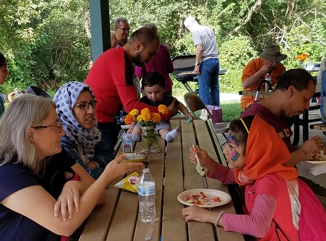 A picnic for Afghan families held at Chinquapin Park in Alexandria by Christ Church in Alexandria with Rock Spring UCC in Arlington.