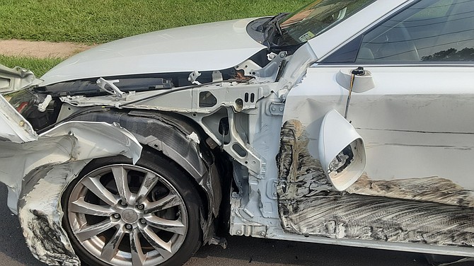 The police were called after this parked car was hit on Rolling Road.